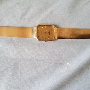 Longines Mens wristwatch. 14 Kt gold  Quartz movement.